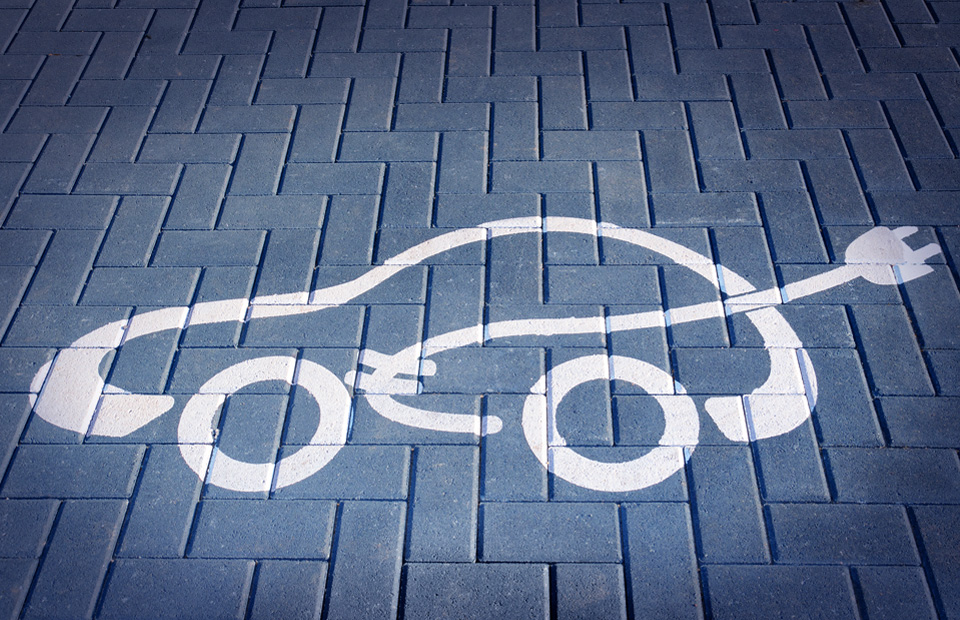 Ein gezeichnetes Elektroauto zum Thema Treibhausgasminderungsquote der DEW21.
